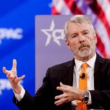 Michael Saylor speaking at a financial event, emphasizing Bitcoin's role in Strategy’s investment success and long-term corporate strategy.