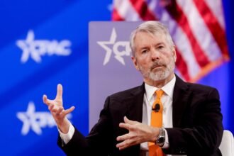 Michael Saylor speaking at a financial event, emphasizing Bitcoin's role in Strategy’s investment success and long-term corporate strategy.