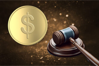 Gavel next to a gold coin symbolizing stablecoin legislation as US Senate advances GENIUS Act for crypto regulation