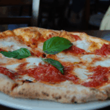 What Is The Name Of The Classic Pizza Topped With Tomato Mozzarella And Basil